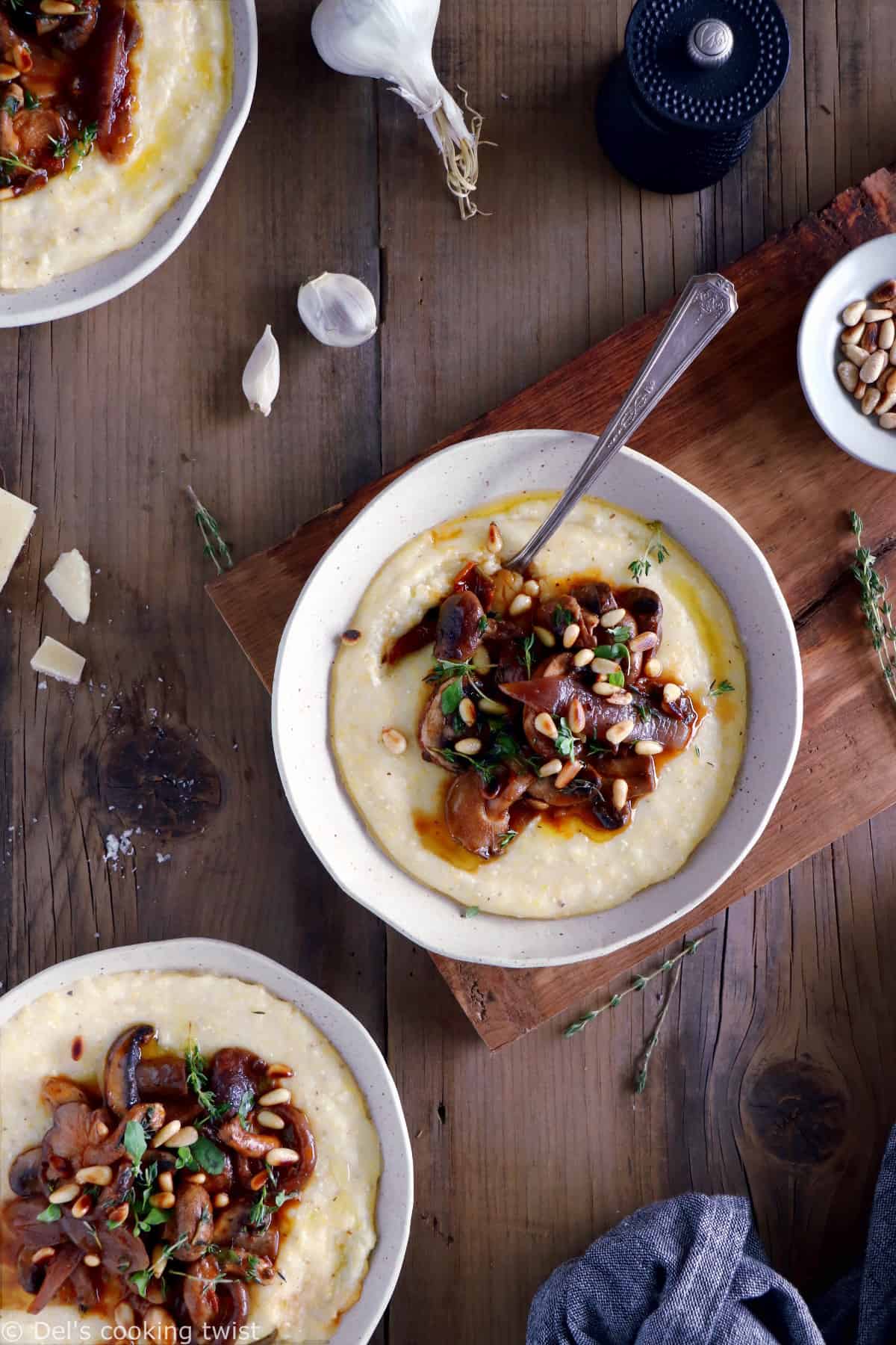 Parmesan polenta with thyme mushroom ragu makes a hearty plant-based dinner recipe for those chilly days. Enjoy with a glass of wine!