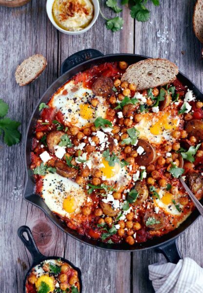 Take the shakshuka to the next level with this deluxe shakshuka recipe, featuring the classic baked eggs and tomatoes with an extra kick of spicy roasted potatoes and chickpeas.