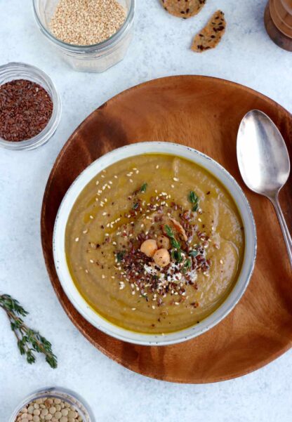 Grandma's nourishing lentil soup with roasted vegetables and all-spice is hearty, healthy, and packed with plant-based protein.