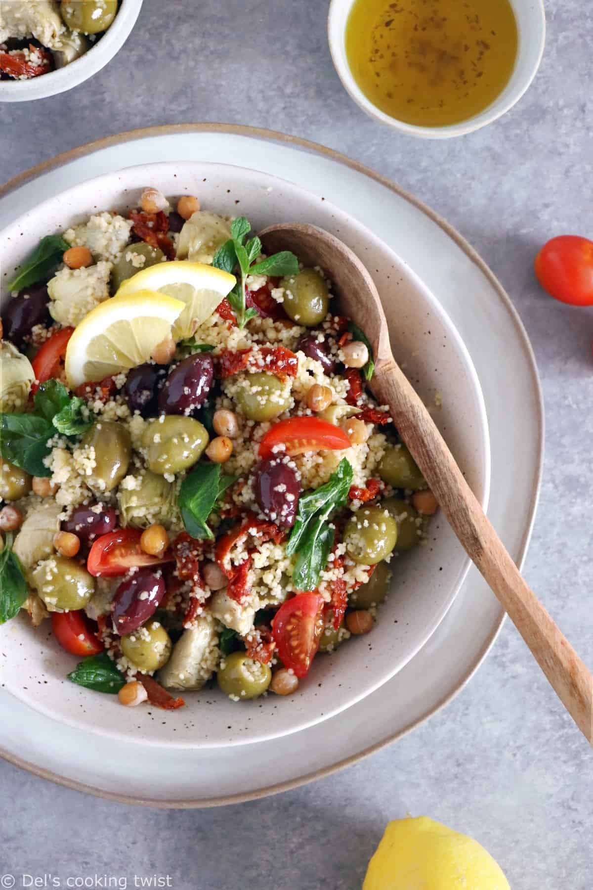 Add some sun to your plate with this easy Mediterranean couscous salad with chickpeas, olives and artichoke hearts.