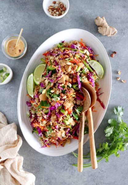 This crunchy Thai quinoa salad served with a ginger peanut butter dressing is a lovely twist to the classic Pad Thai.