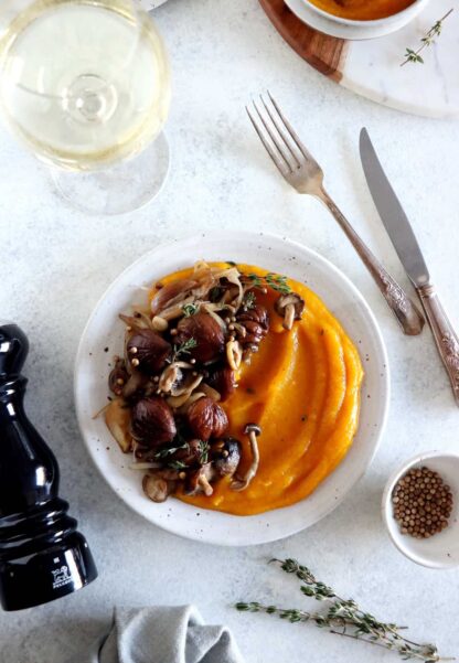 Both festive and hearty, this chestnut and mushroom casserole with allspice butternut squash puree will make an elegant centerpiece on your holiday table.