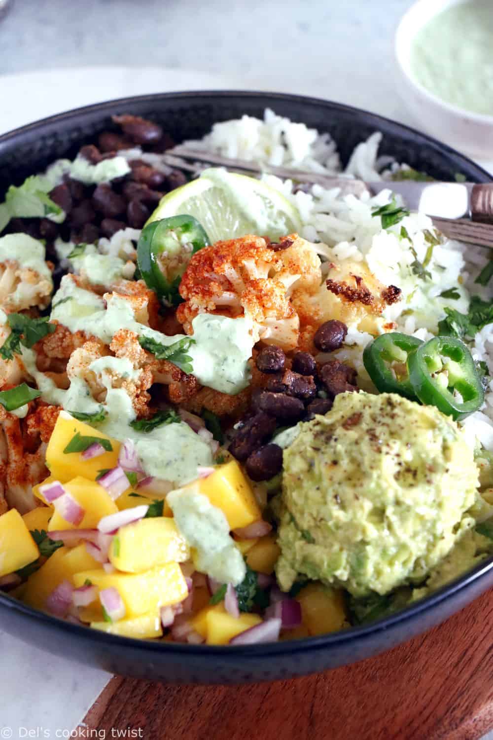 Healthy, colorful, and satisfying, this vegetarian cauliflower burrito bowl will brighten up your lunch game.