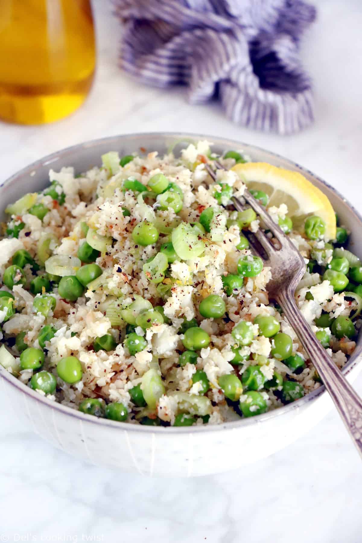 Learn how to make healthy cauliflower rice with peas in no time. This super easy side recipe is a great substitute for rice and the perfect way to sneak in more veggies into your diet.