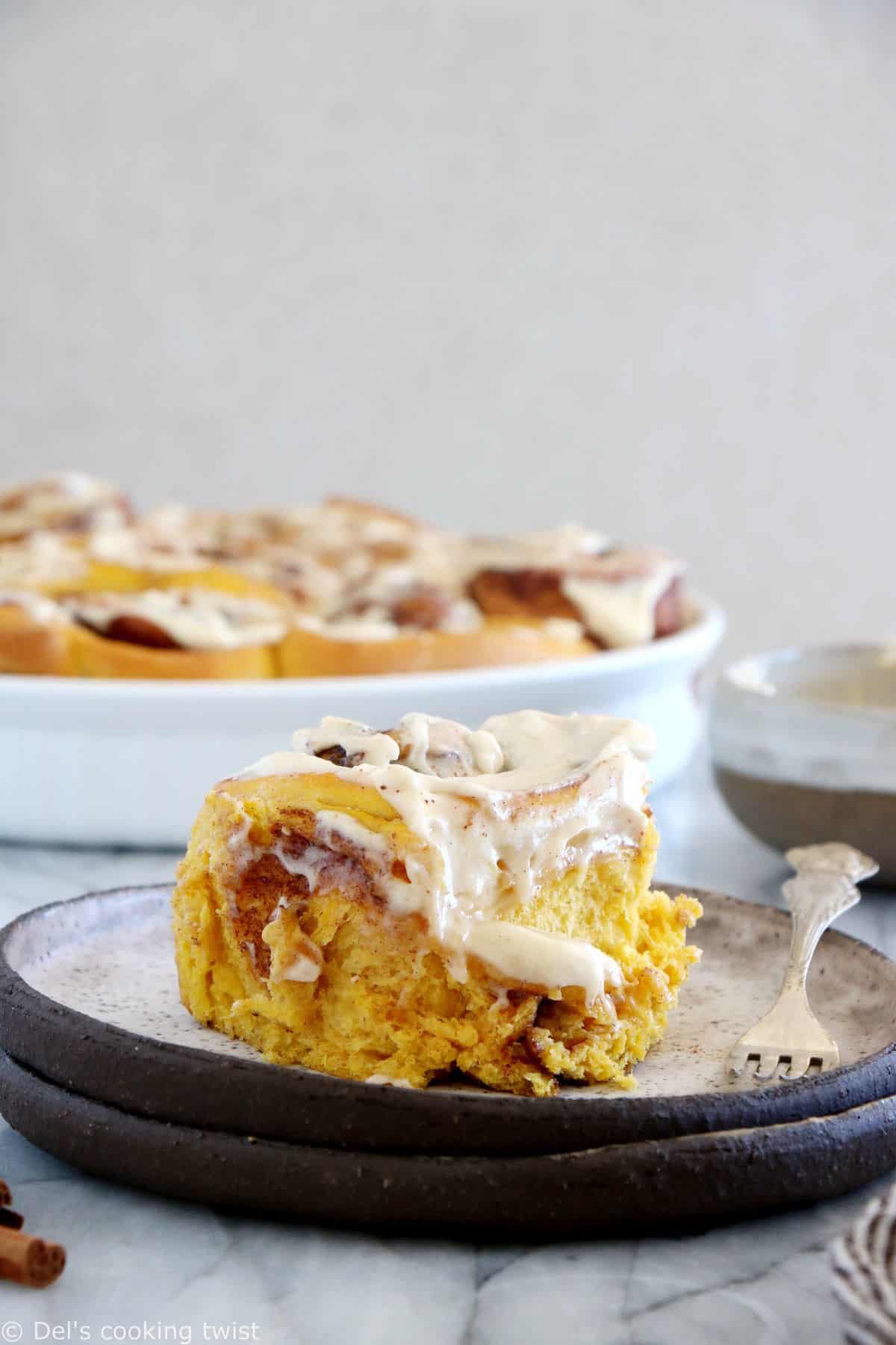 These pumpkin cinnamon rolls are soft, pillowy, prepared with real pumpkin puree, and loaded with warm pumpkin spice.