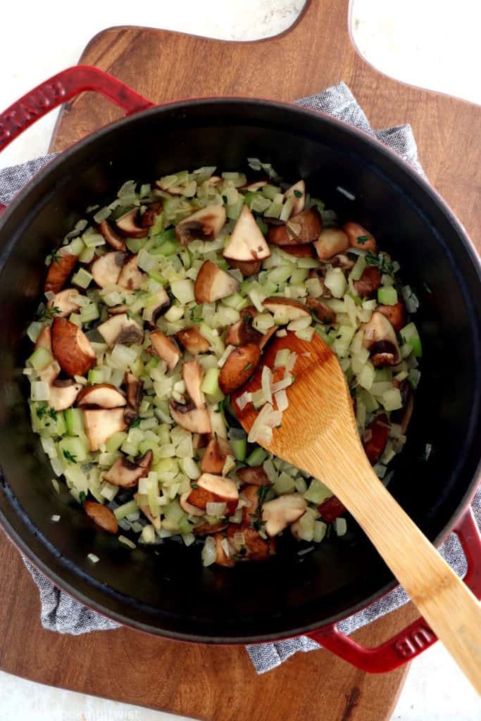 A rustic vegetarian pot pie loaded with hearty veggies coated in a creamy gravy, and tucked in between two crunchy flaky pie crusts.