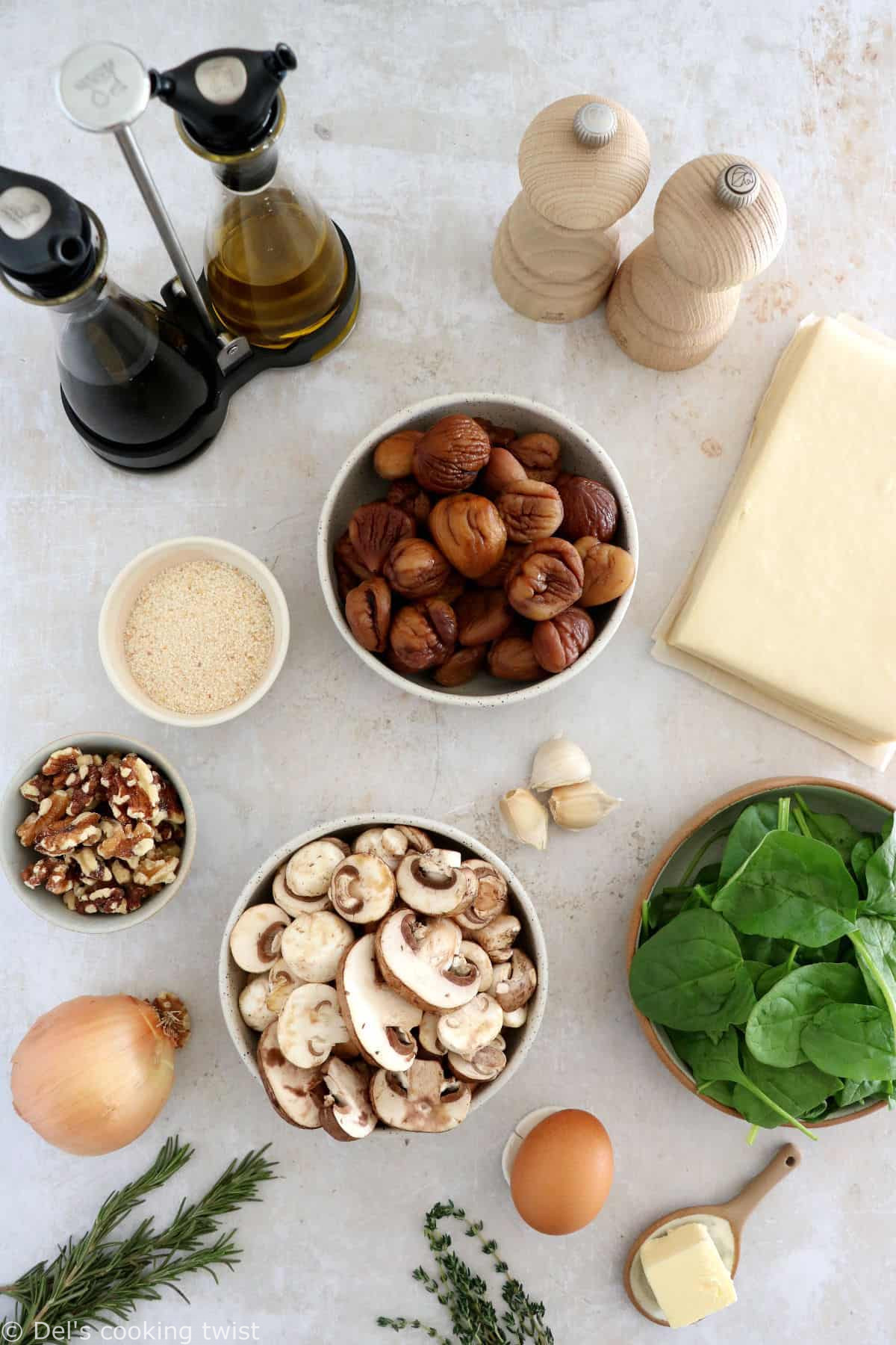 Vegetarian mushroom wellington is prepared with a simple thyme mushroom-chestnut filling wrapped inside a flaky puff pastry.