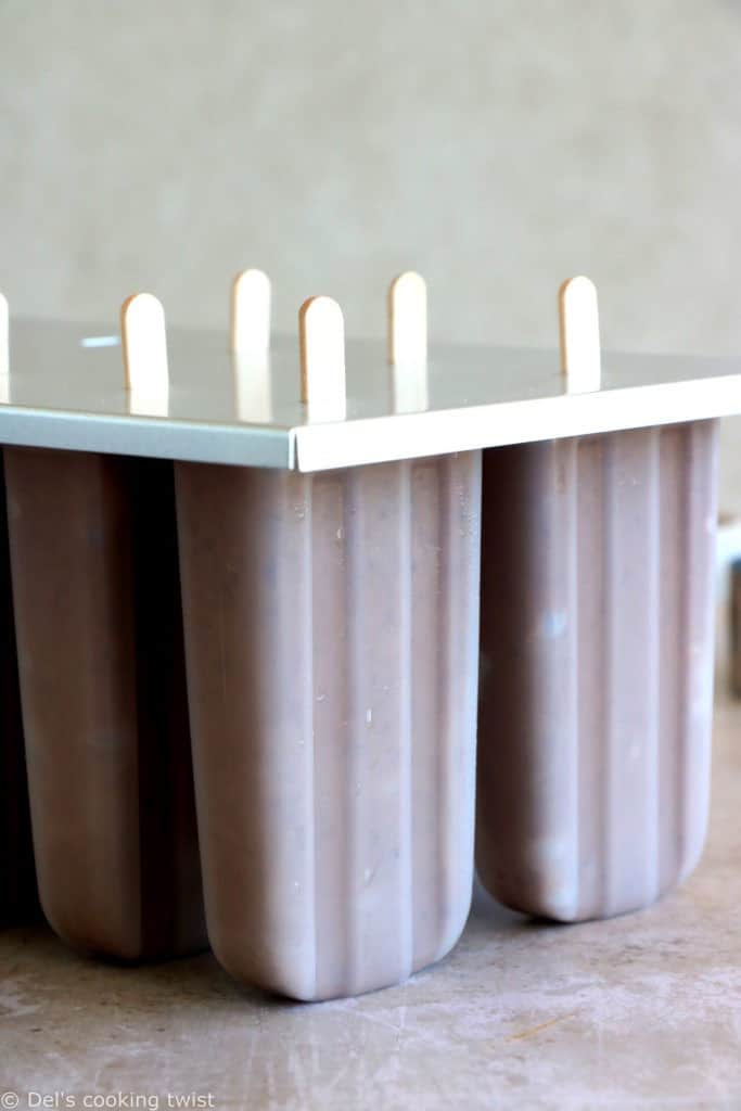 Chocolate almond butter banana popsicles make a decadent summer treat. Both rich and fudgy, they're entirely vegan and prepared with nutritious, natural ingredients. The perfect healthy snack on a stick.