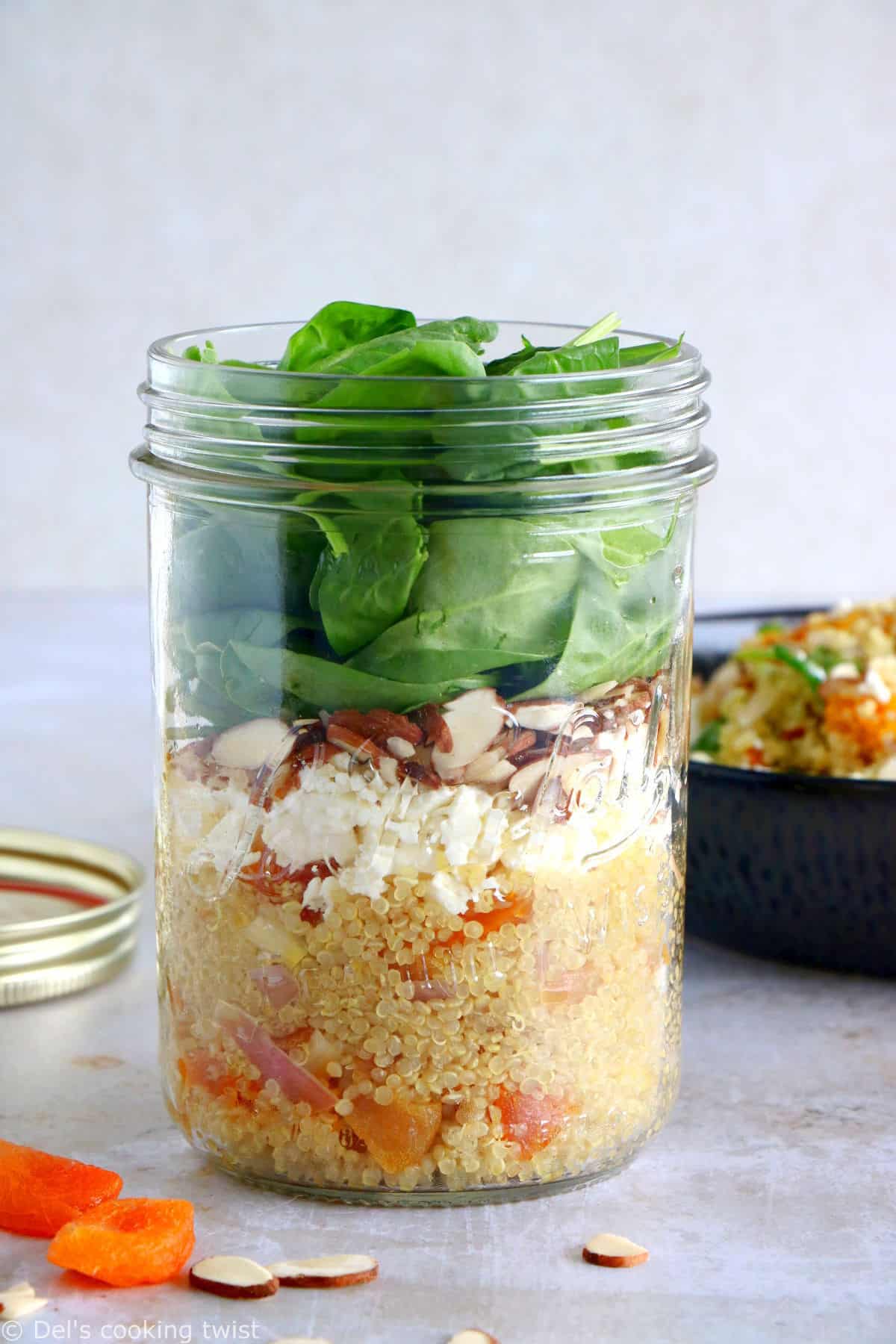 https://www.delscookingtwist.com/wp-content/uploads/2022/07/Curried-Apricot-Quinoa-Salad-Jar_1.jpg