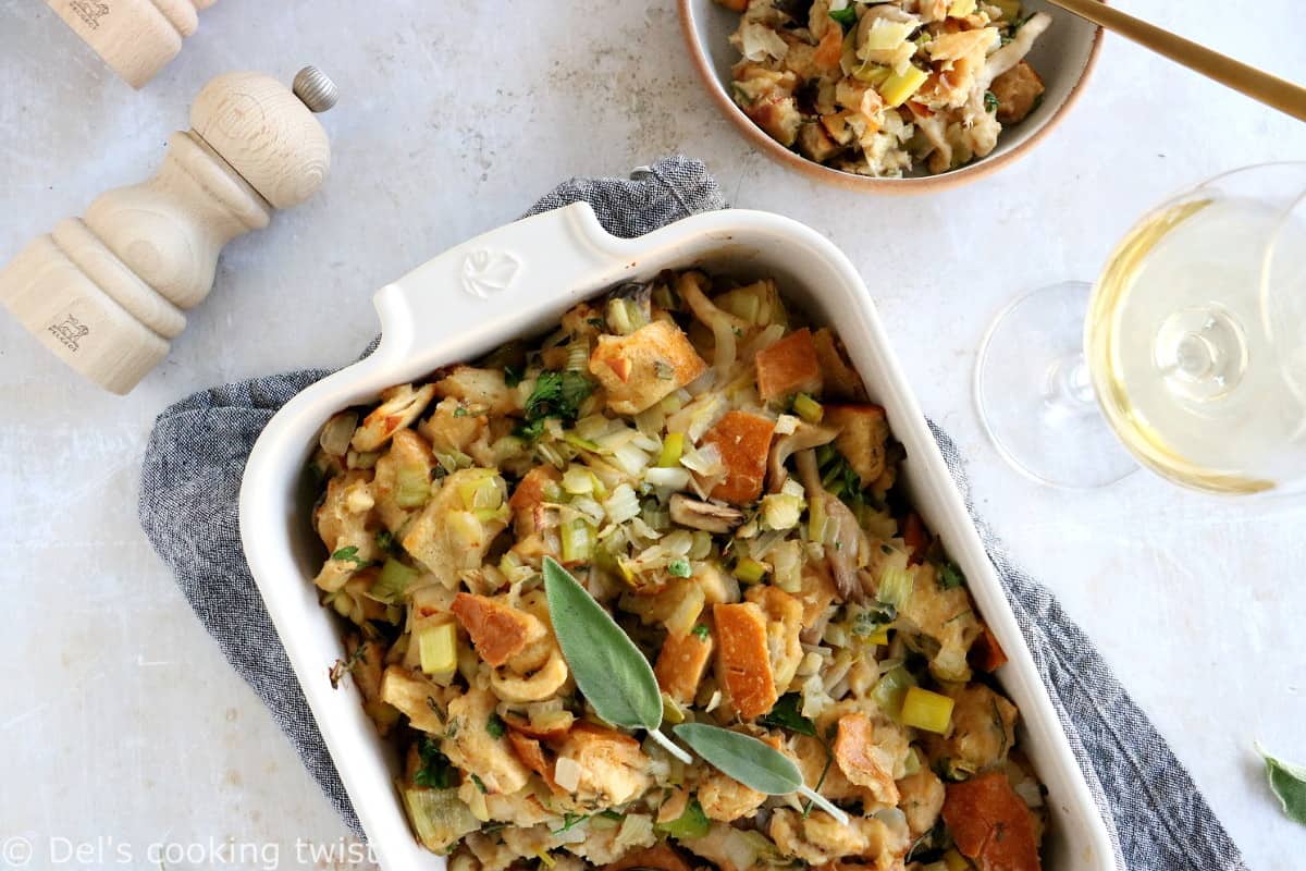 This vegetarian stuffing with leeks and wild mushrooms features a loaf of bread teared apart, veggies for a wonderful texture and depth of flavor, and a perfect seasoning with herbs.