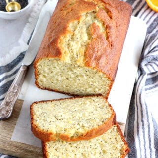 Orange poppy seed yogurt loaf is light, perfectly moist, and loaded with zesty flavors. Quick and easy to make, it's the perfect loaf for an afternoon tea!