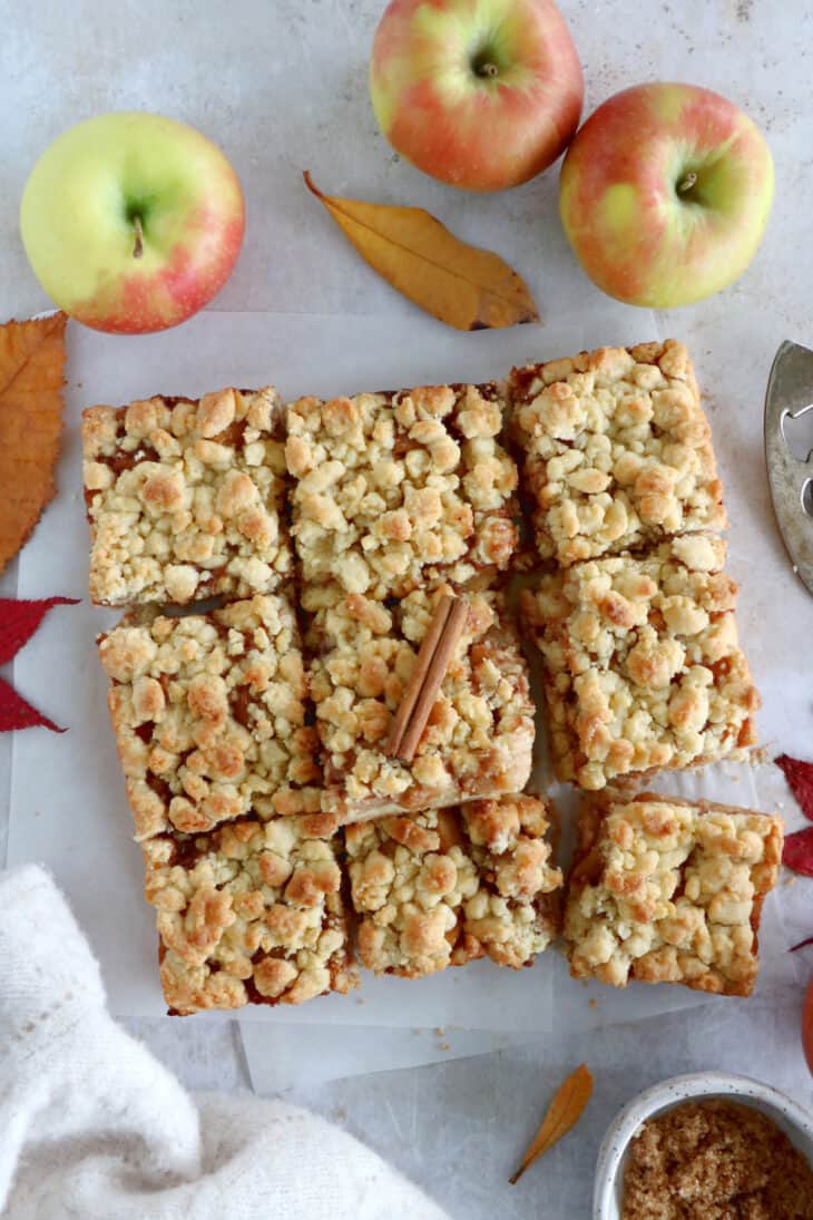 You'll love these EASY apple crumble bars! They feature a simple shortbread crust for both the bottom and the top crumble part, and a soft apple cinnamon filling inside.