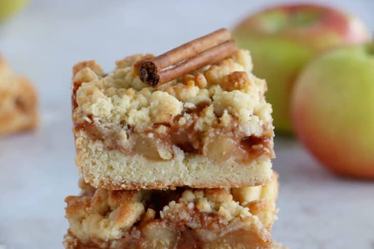 You'll love these EASY apple crumble bars! They feature a simple shortbread crust for both the bottom and the top crumble part, and a soft apple cinnamon filling inside.