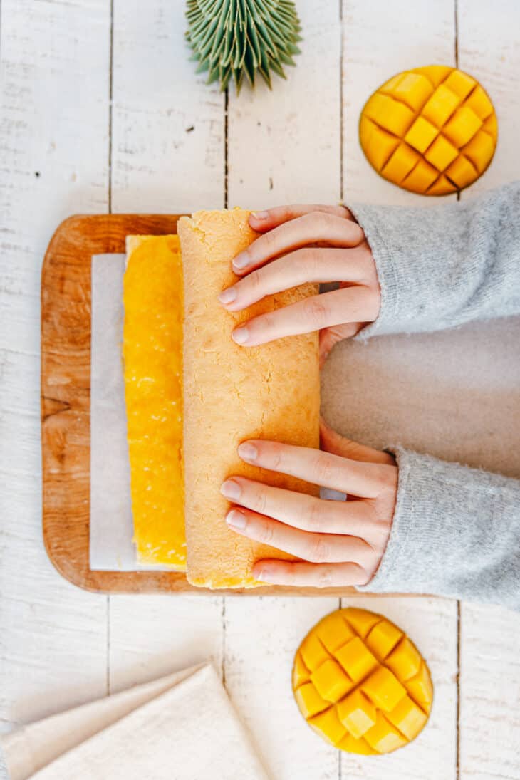 This chocolate mango yule log will bring some subtle exotic flavors to your traditional Christmas dessert.