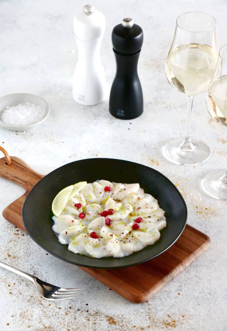 This sea scallops carpaccio with lime is full of freshness and zesty flavors. It makes an elegant first course for a festive dinner party.