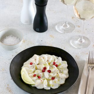 This sea scallops carpaccio with lime is full of freshness and zesty flavors. It makes an elegant first course for a festive dinner party.