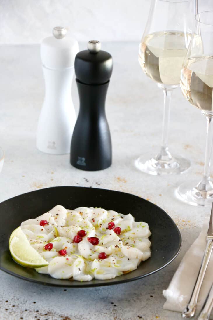 This sea scallops carpaccio with lime is full of freshness and zesty flavors. It makes an elegant first course for a festive dinner party.