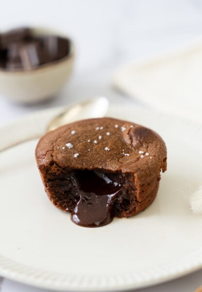 Molten chocolate lava cake is a decadent individual dessert, with a mind-blowing gooey chocolate center that flows out when you slice it.