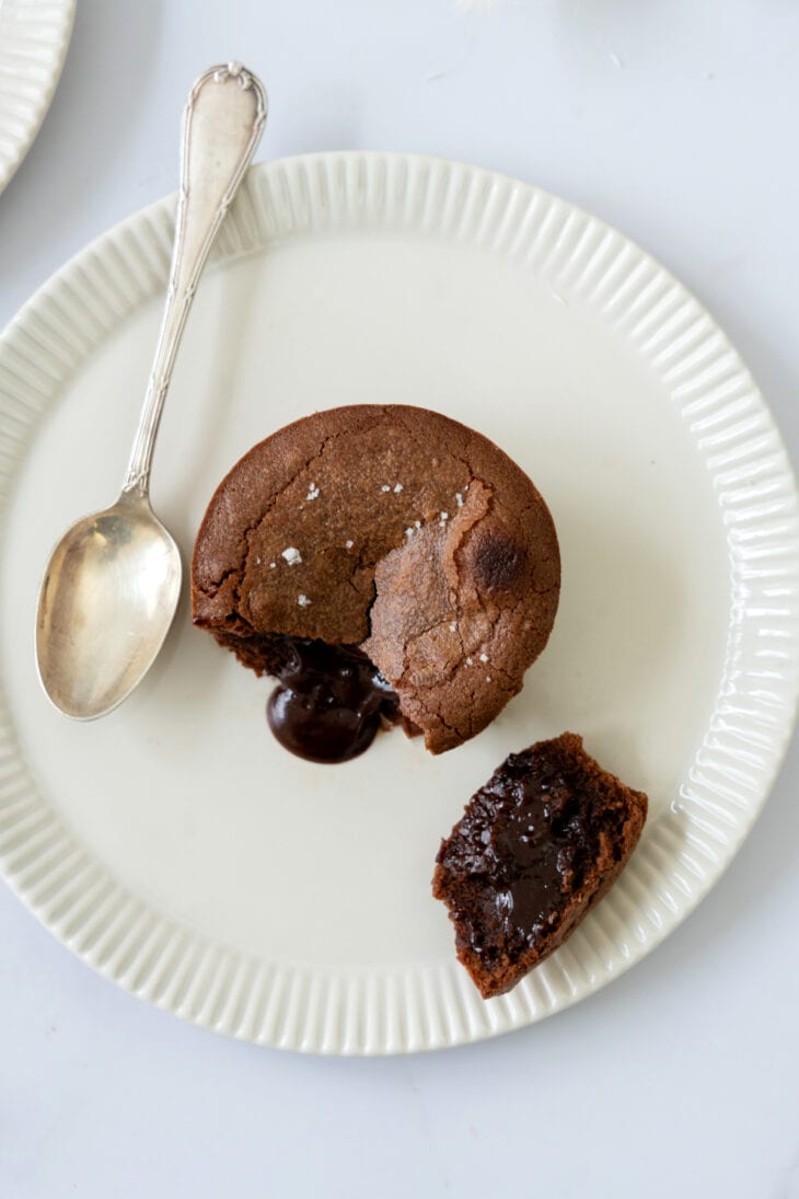 Molten chocolate lava cake is a decadent individual dessert, with a mind-blowing gooey chocolate center that flows out when you slice it.