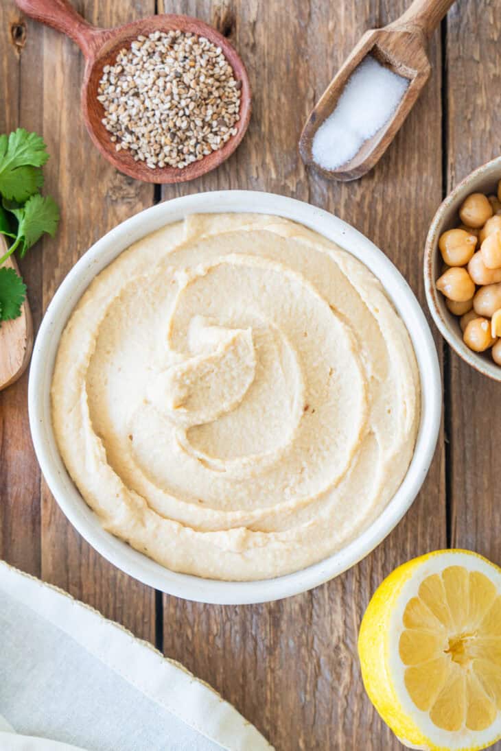 Roasted garlic hummus is the ultimate hummus recipe! Super creamy, sweet and slightly smoky, this dip makes a fantastic snack or appetizer.