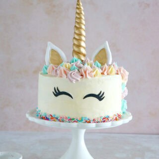 This unicorn cake is a 3-layer funfetti cake, covered with white and pastel buttercream. Perfect for a kid's birthday party or a baby shower.