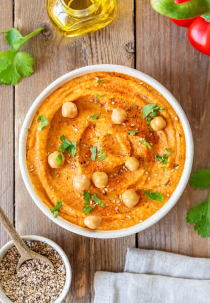 This roasted red pepper hummus is my favorite hummus recipe. It's a fantastic dip, easy to make, and loaded with sweet and smoky flavors.