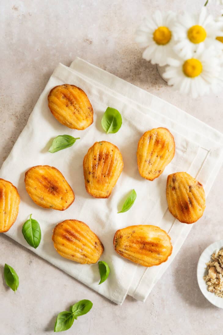 These delicate savory madeleines with goat cheese and sun-dried tomatoes are the perfect little appetizer treat, with a French touch!