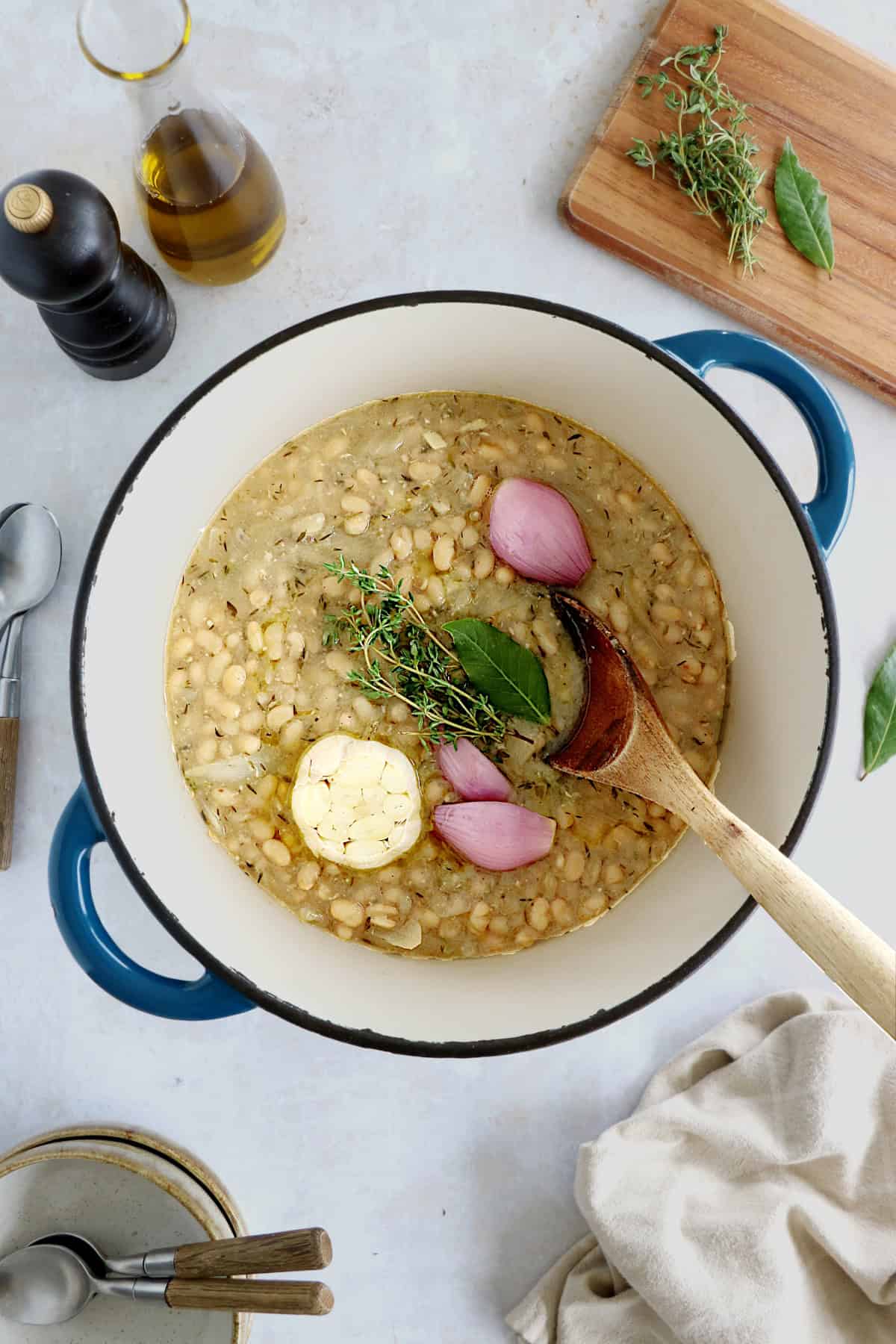 These brothy white beans infused with fresh herbs make a cozy meal packed with flavors. They're easy to make (no soaking time needed).