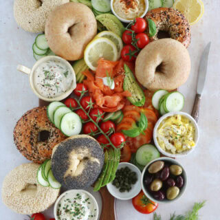 Take brunch to the next level with this smoked salmon bagel brunch board! Easy to assemble with lots of different toppings, it's the perfect grazing board to entertain with for a casual intimate brunch or a festive party brunch with friends.