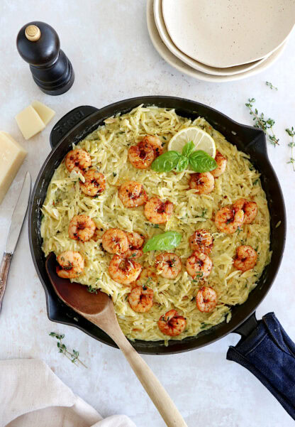 This 30-minute creamy shrimp orzo risotto is prepared with orzo pasta instead of arborio rice and is both quicker and easier to make.