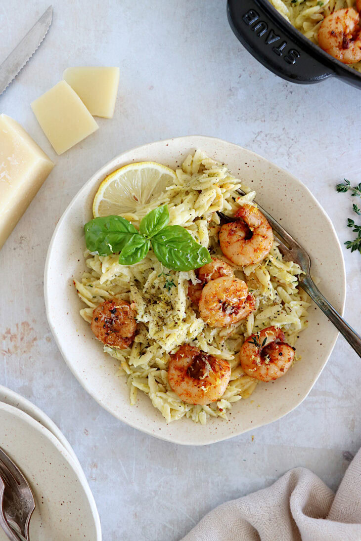 This 30-minute creamy shrimp orzo risotto is prepared with orzo pasta instead of arborio rice and is both quicker and easier to make.