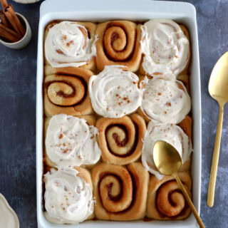 These are the BEST Cinnamon Rolls! Soft and fluffy, they're packed with cinnamon flavors and topped with a gooey cream cheese frosting.