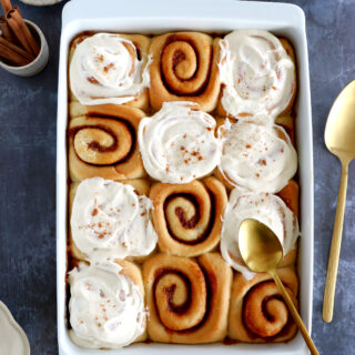 These are the BEST Cinnamon Rolls! Soft and fluffy, they're packed with cinnamon flavors and topped with a gooey cream cheese frosting.