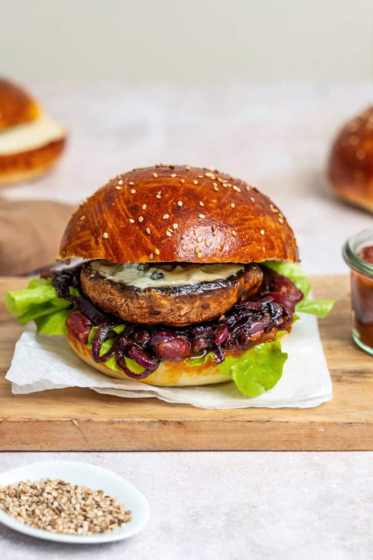 This Portobello mushroom burger with blue cheese and caramelized onions is loaded with incredible umami flavors.