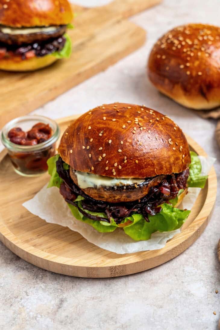 This Portobello mushroom burger with blue cheese and caramelized onions is loaded with incredible umami flavors.