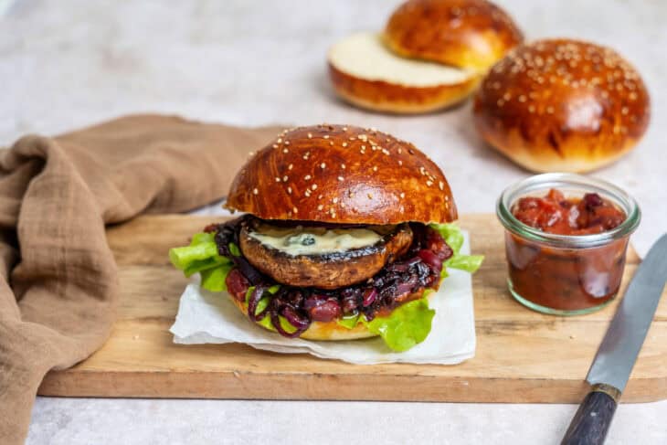 This Portobello mushroom burger with blue cheese and caramelized onions is loaded with incredible umami flavors.