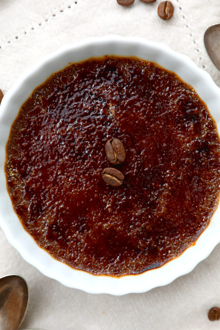This coffee crème brûlée features a smooth and creamy coffee custard filling and a caramelized sugar topping.