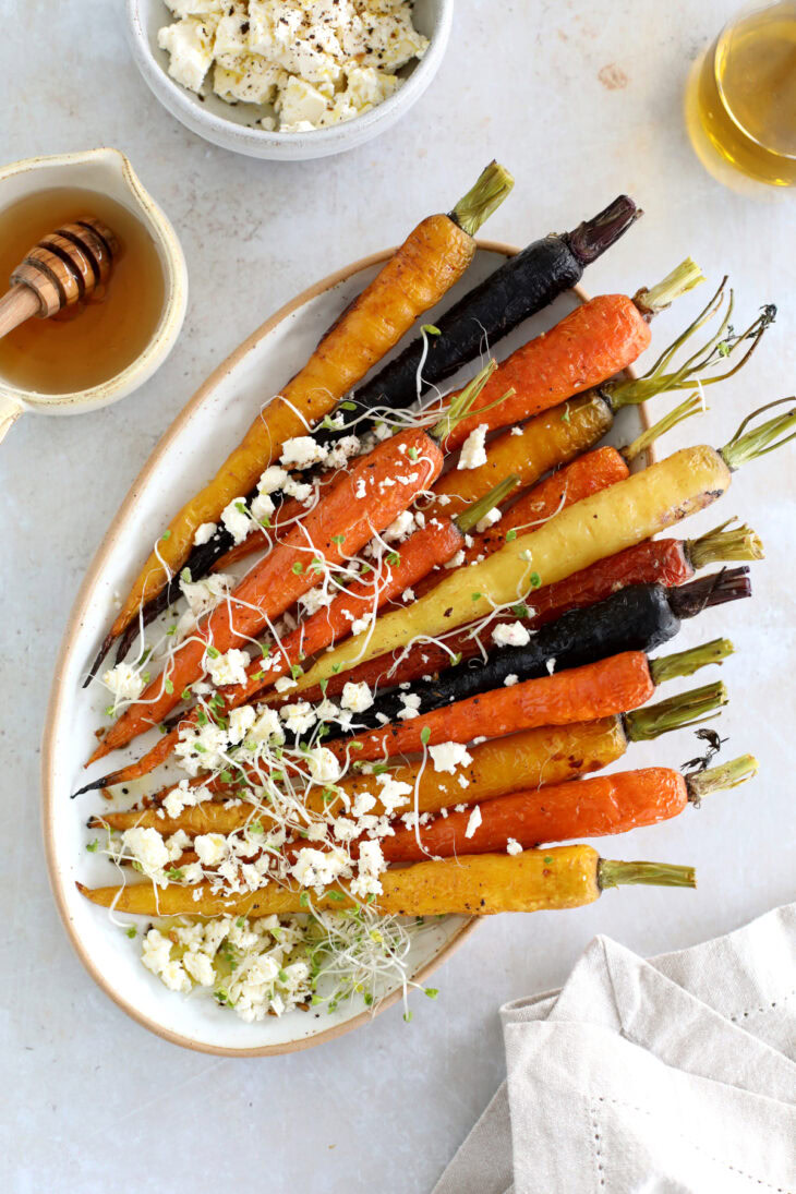 These roasted carrots with feta make a simple vegetarian side for Easter, Thanksgiving, and every occasion in between!